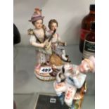 A MEISSEN PORCELAIN GROUP OF TWO MUSICIANS TOGETHER WITH A GERMAN FIGURAL VESTA HOLDER WITH