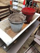 A GALVANIZED TROUGH AND FIVE BUCKETS.