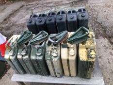 VARIOUS JERRY CANS AND FOUR MILITARY TRENCHING SPADES.