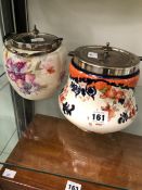 TWO POTTERY BISCUIT BARRELS WITH ELECTROPLATE LIDS