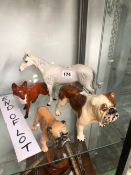 A BESWICK DAPPLE GREY HORSE, A FOX AND TWO POTTERY BULLDOG FIGURES