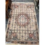 A SMALL EASTERN PALE GROUND RUG. 194 x 192cms