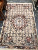 A SMALL EASTERN PALE GROUND RUG. 194 x 192cms