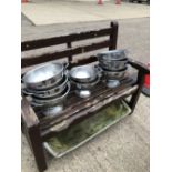 A QUANTITY OF STAINLESS STEEL POTATO PANS.