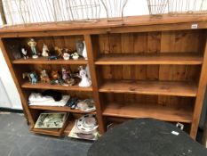 A LARGE OPEN FRONT PINE BOOKCASE