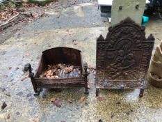 A CAST IRON FIRE GRATE AND BACK.