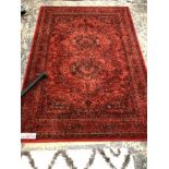 A MACHINE MADE PERSIAN PATTERN CARPET 199 X 140CMS, AND A MODERN DEEP PILE RUG. 162 X 120CMS.