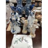 A PAIR OF DELFT BLUE AND WHITE VASES, PORCELAIN FIGURES AND PLATES