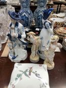 A PAIR OF DELFT BLUE AND WHITE VASES, PORCELAIN FIGURES AND PLATES