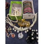 COSTUME JEWELLERY TO INCLUDE A QUANTITY OF STACKING BANGLES, VARIOUS NECKLACES ETC.