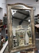 A HALLMARKED SILVER EASEL BACK TABLE MIRROR.