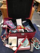 A COLLECTION OF PREDOMINANTLY MODERN COSTUME JEWELLERY IN A CARRY TRAVEL CASE.