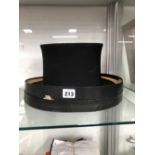 A BOXED TRESS & CO COLLAPSABLE BLACK TOP HAT
