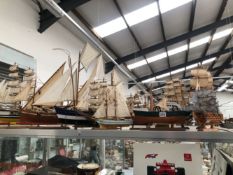 TEN WOODEN MODEL BOATS, ALL BUT A TUG IN FULL SAIL