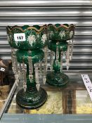 A PAIR OF VICTORIAN FLORAL ENAMELLED GREEN GLASS LUSTRES