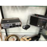 A SINCLAIR MICROVISION TV, AN AKAI CR-800 CARTRIDGE RECORDER AND A SANYO 6-BAND RP 8550 RADIO