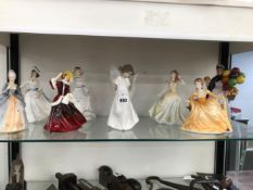 EIGHT PORCELAIN LADIES TOGETHER WITH A NAO SWAN