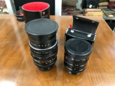 TWO CAMERA LENSES IN CASES, ONE PENTACON 2.8/135 MADE IN G.D.R THE OTHER JAPANESE TELEMAC VARIO 2X