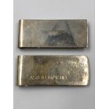 TWO ASTON MARTIN LOGO MONEY CLIPS. ONE WITH FULL HALLMARK, THE OTHER STAMPED 925. GROSS WEIGHT 54.