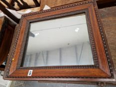 AN ANTIQUE ROSE WOOD WALL MIRROR