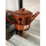 A ROYAL WORCESTER SCOTTIE WILSON RED WARE TEA POT.