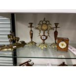 AN EARLY 20th C. BRASS AND HARDSTONE CLOCK GARNITURE TOGETHER WITH A WOODEN CASED DESK CLOCK AND