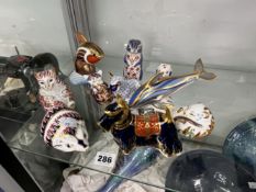 A GROUP OF TEN ROYAL CROWN DERBY PAPERWEIGHTS TO INCLUDE A SCOTTISH TERRIER, DOLPHIN, HEDGEHOG,