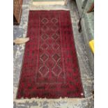 A HAND MADE EASTERN SMALL RUG
