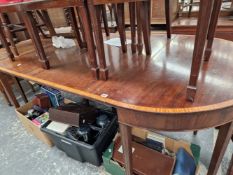 AN ANTIQUE MAHOGANY AND SATIN WOOD BANDED D END DINING TABLE WITH TWO LEAVES.