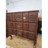 AN EASTERN CARVED HARDWOOD THREE DRAWER CHEST