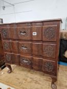 AN EASTERN CARVED HARDWOOD THREE DRAWER CHEST