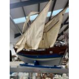 A LARGE HAND MADE MODEL OF AN EASTERN SAILING VESSEL.