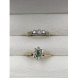 A 9ct HALLMARKED EMERALD AND DIAMOND CLUSTER RING, TOGETHER WITH AN 18ct GOLD AND PLATINUM THREE
