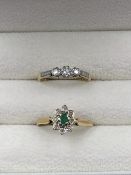 A 9ct HALLMARKED EMERALD AND DIAMOND CLUSTER RING, TOGETHER WITH AN 18ct GOLD AND PLATINUM THREE