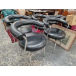 SIX RETRO LEATHER AND CHROME SWIVEL ARM CHAIRS