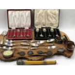 HALLMARKED SILVER TO INCLUDE TWO CASED SETS OF SIX TEASPOONS, A WATCH CASE, FOUR NAPKIN RINGS, EIGHT