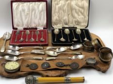 HALLMARKED SILVER TO INCLUDE TWO CASED SETS OF SIX TEASPOONS, A WATCH CASE, FOUR NAPKIN RINGS, EIGHT