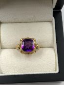 A VINTAGE CUSHION CUT GEMSET RING IN A BASKET TYPE RING MOUNT. FINGER SIZE P. MARKED 18K W&A FOR