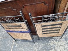 TWO FOLDING IRON AND RATTAN STANDS