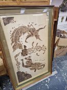 A LARGE FAR EASTERN EMBOSSED PRINT IN A HARD WOOD FRAME