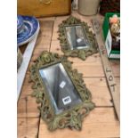 A PAIR OF VINTAGE CAST BRASS FRAMED WALL MIRRORS