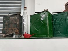 THREE VINTAGE FUEL CANS, THREE OIL CANS AND A BOTTLE.