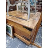 A HARDWOOD LIFT TOP STORAGE BOX COFFEE TABLE.