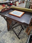 A 19th C. BUTLERS TRAY ON FOLDING STAND