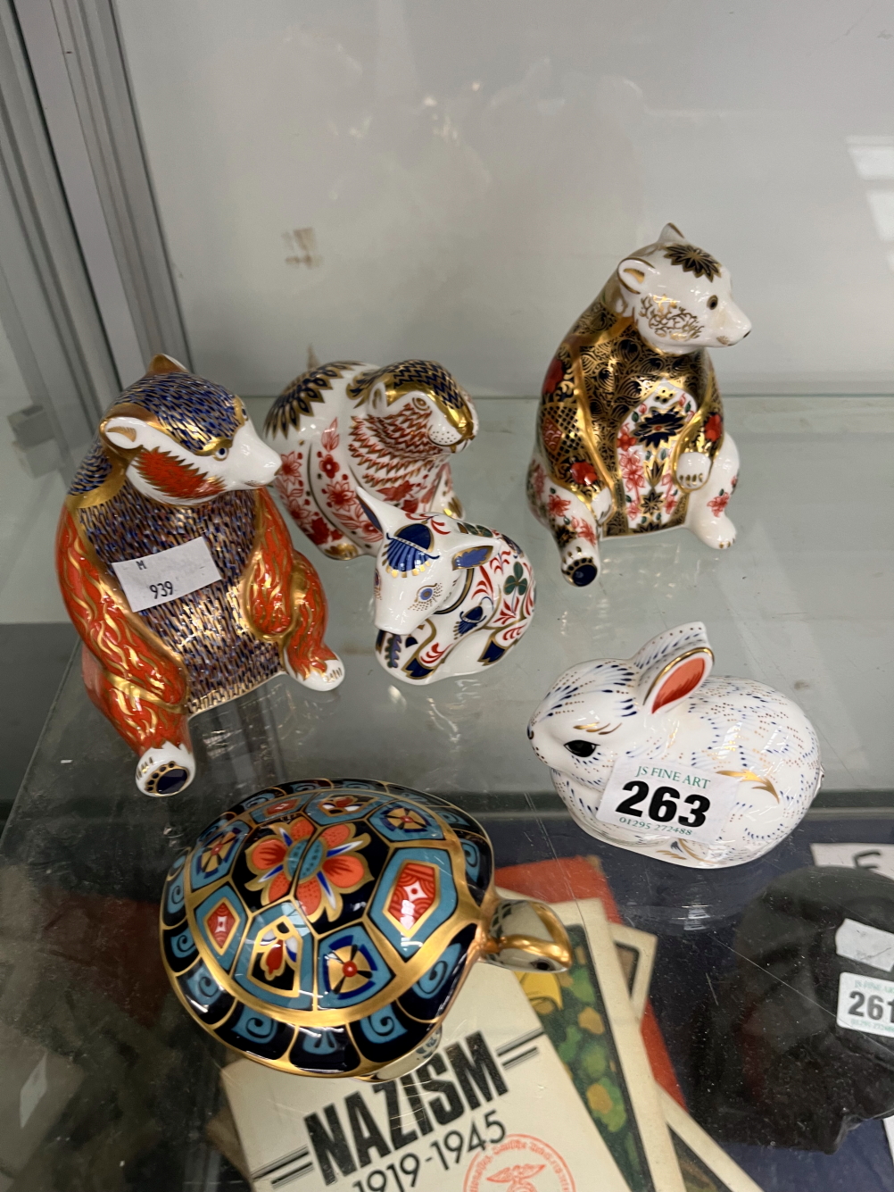 A GROUP OF SIX ROYAL CROWN DERBY PAPERWEIGHTS TO INLCLUDE A BUNNY, TERRAPIN, COW, BEARS ETC.