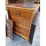 A SMALL TWO DRAWER FILING CABINET