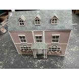 A DOLLS HOUSE OF NINE ROOMS WITH SOME FITTINGS