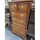 A SMALL WALNUT ANTIQUE STYLE STEREO CABINET