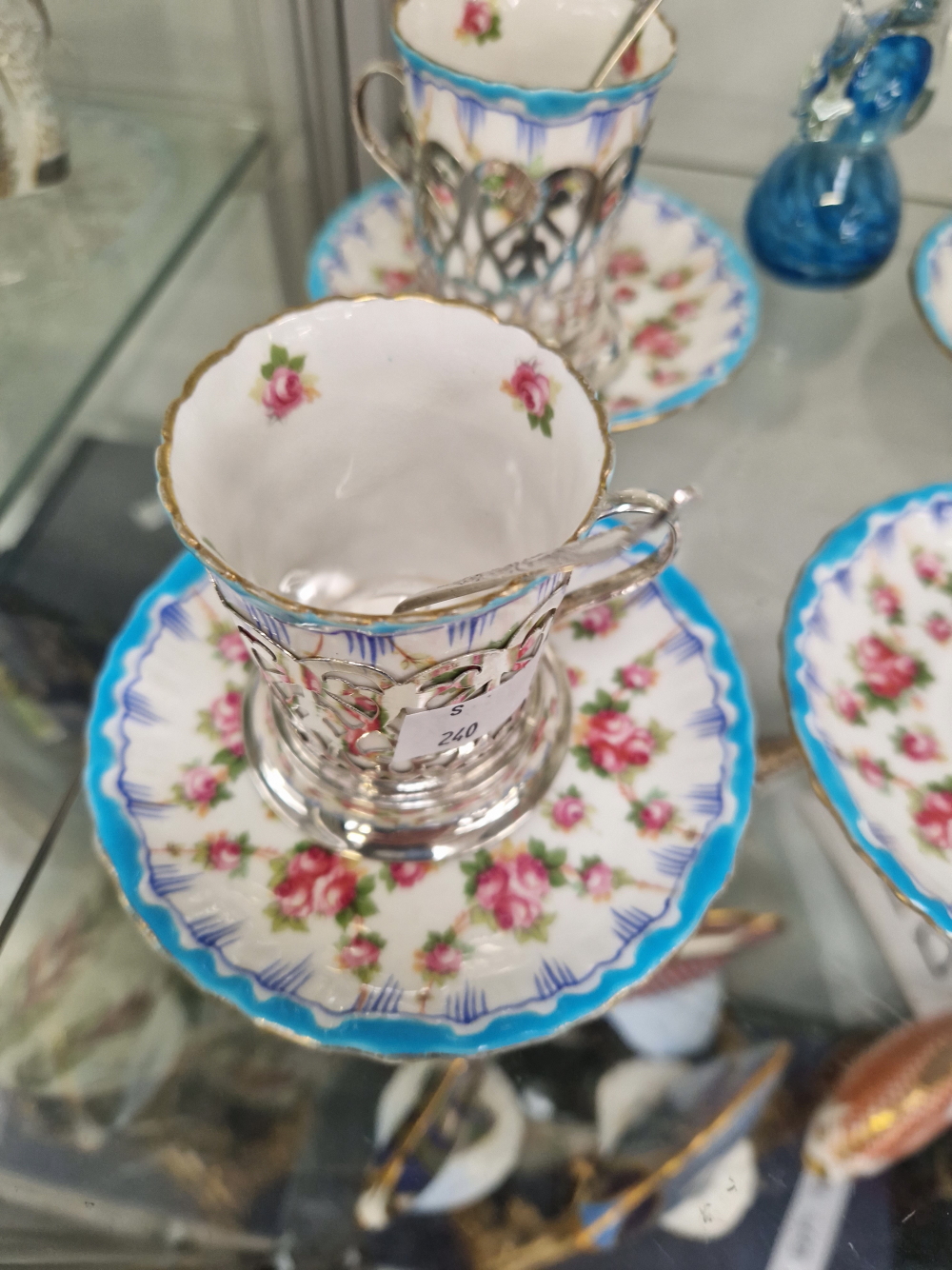 A ROYAL DOULTON COFFEE CAN AND SAUCER SET WITH HALLMARKED SILVER CARRIERS AND FIVER SILVER - Image 6 of 13