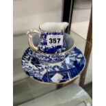 A ROYAL CROWN DERBY BLUE AND WHITE SMALL CREAM JUG AND SUGAR BOWL AND A SMALL SAUCER.